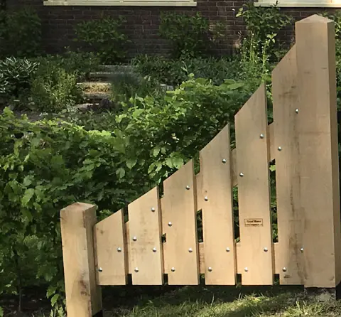 Voorbeeld 13: Zijkant hek